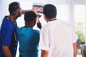 Doctors & Nurses Looking at a X-ray